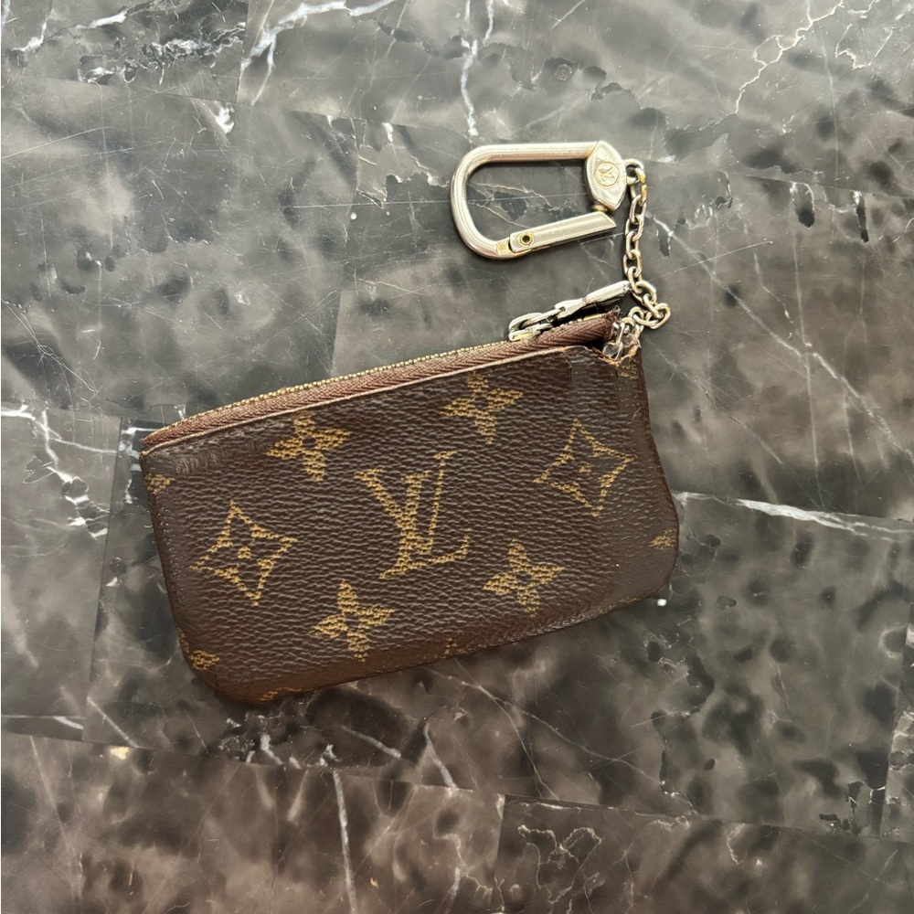Used Authentic  Louis Vuitton Monogram Key Pouch, purchased directly from LV